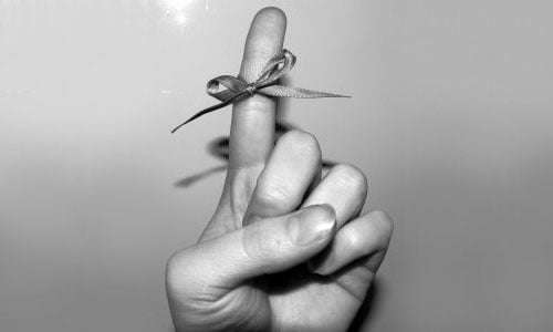 finger with ribbon