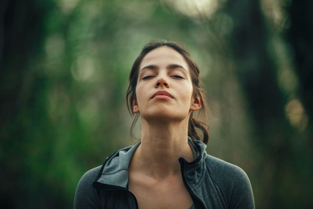 woman breathing in
